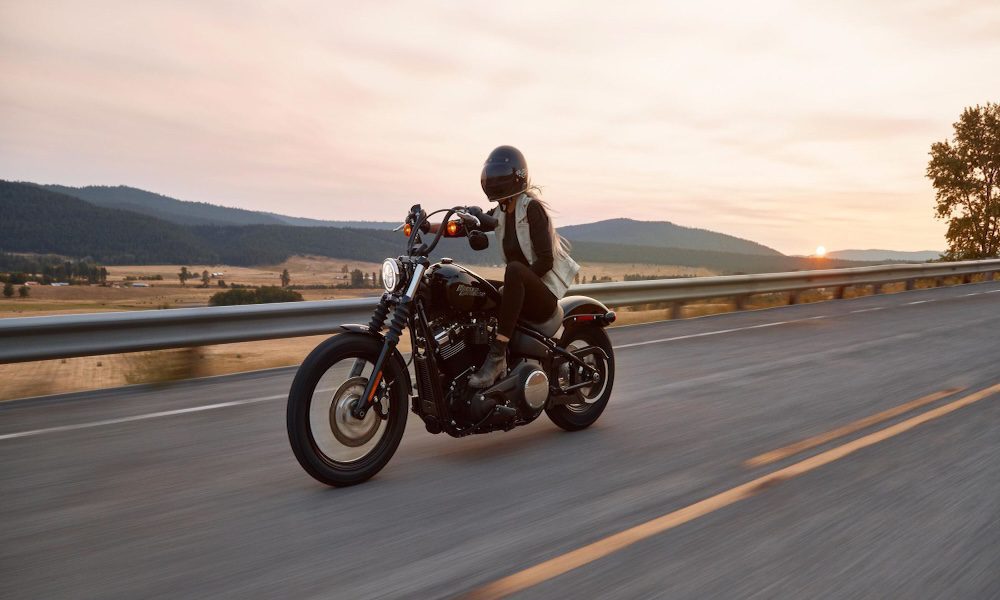 woman-on-motorcycle-driving-on-the-road