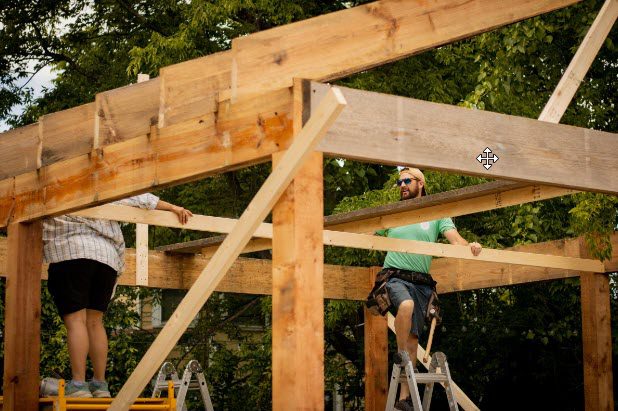 men-building-home-addition